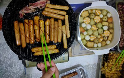 High angle view of person preparing food