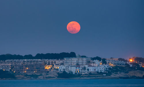 Scenic view of sea against sky at night