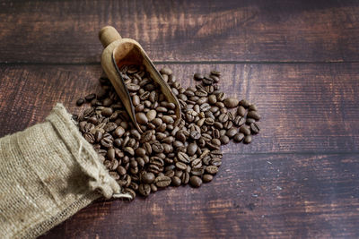 High angle view of roasted coffee beans on table