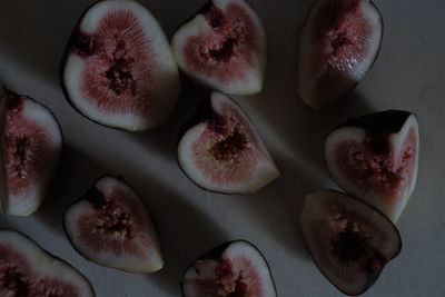 Directly above shot of sliced figs on table