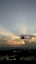 View of sea against sunset sky