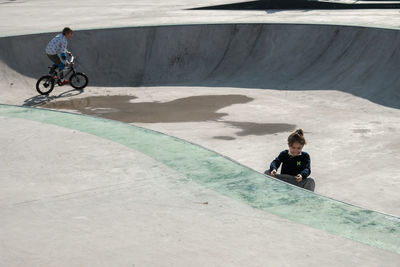 Low angle view of childs standing on park