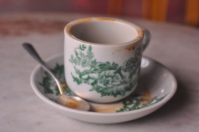 Close-up of tea cup on table