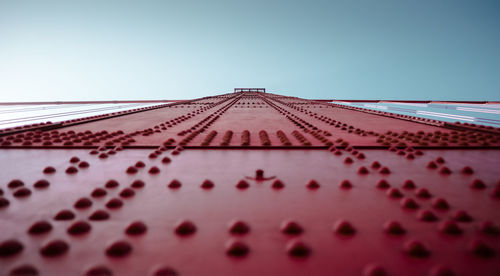 Low angle view of bridge clear sky