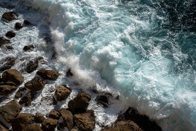 High angle view of waves in sea