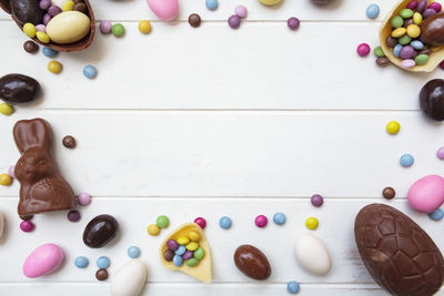 High angle view of multi colored candies on table