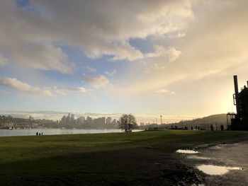 Scenic view of field against sky during sunset