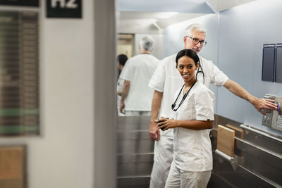 Doctors standing in lift