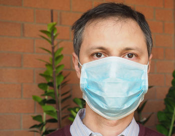 Close-up of man wearing mask