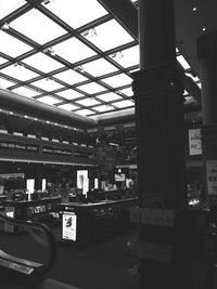 Man in illuminated store