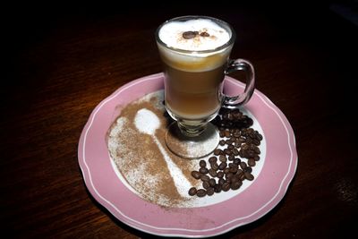 Close-up of coffee cup on table