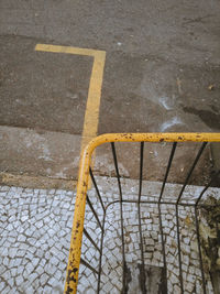 High angle view of arrow sign on street