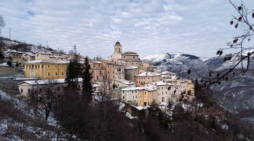 City against sky during winter