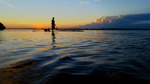 Scenic view of sunset over river