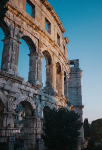 Low angle view of historical building against sky