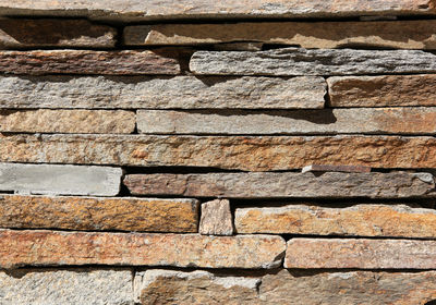 Image of stone tilled wall texture background.