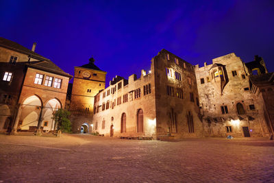 Buildings in city at night