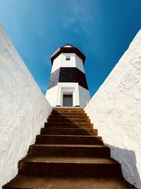 Low angle view of lighthouse against sky