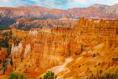 High angle view of rock formations against sky