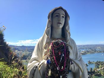 Low angle view of statue against sky