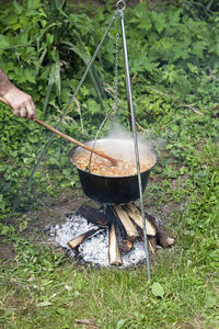 High angle view of beer on barbecue grill