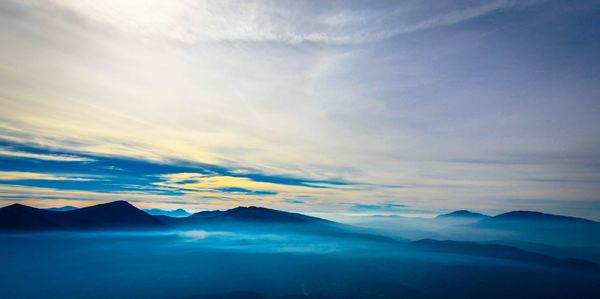 Scenic view of mountains against sky