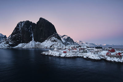 Scenic view of sea against sky during winter