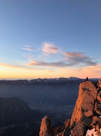 Scenic view of mountains against sky during sunset