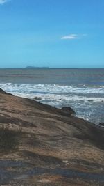 Scenic view of sea against clear blue sky