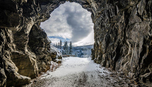 Scenic view of snow covered mountains against sky