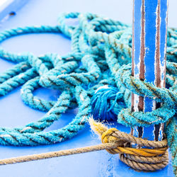 Close-up of rope tied on metal