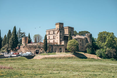 Old built structure against clear blue sky