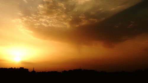 Scenic view of silhouette landscape against sky during sunset