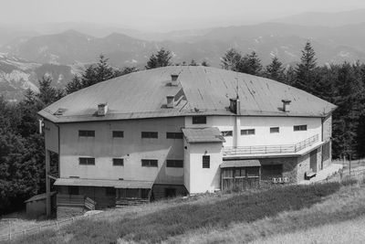 Old abandoned mountain building with the dolomites in the background