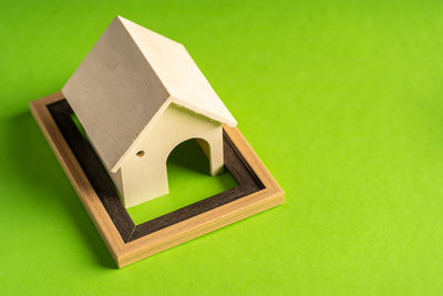 High angle view of stuffed toy on green table