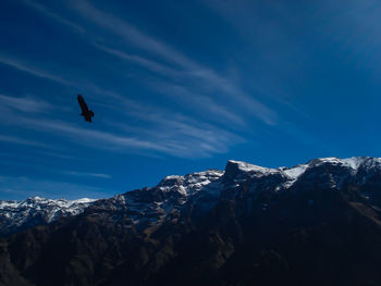 Scenic view of mountains against sky during winter