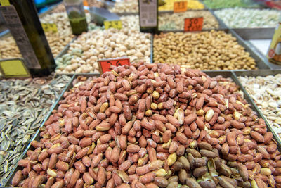 Collection of dried nuts, pistachio and seeds at oriental market, bazaar