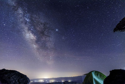 Low angle view of star field against sky at night