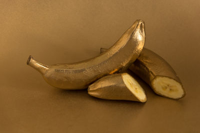 Close-up of bananas against white background