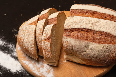 High angle view of bread on cutting board