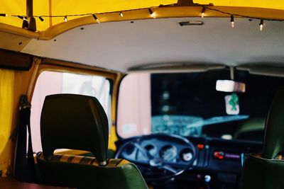 View of blurred steering wheel in car