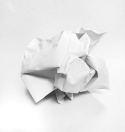 High angle view of paper over white background