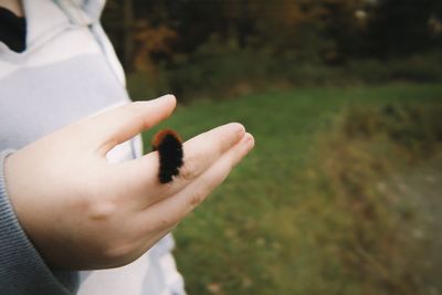 Close-up of woman holding hands