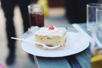 Close-up of cake served on table