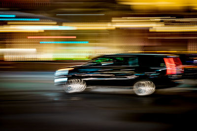 Blurred motion of traffic on road at night