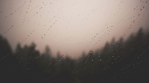 Full frame shot of raindrops on window