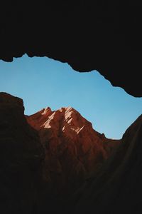 Rock formation with sky in background