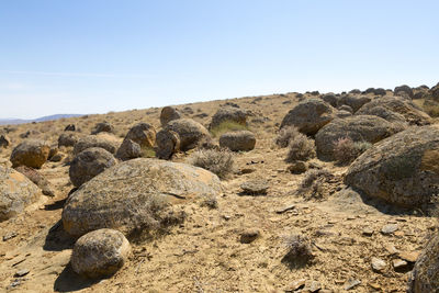 View of rock formations against clear sky