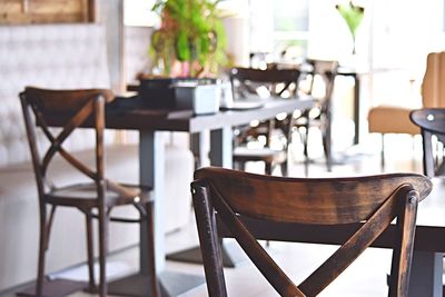 Empty chairs and table in restaurant