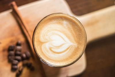 Close-up of coffee on cutting board at home